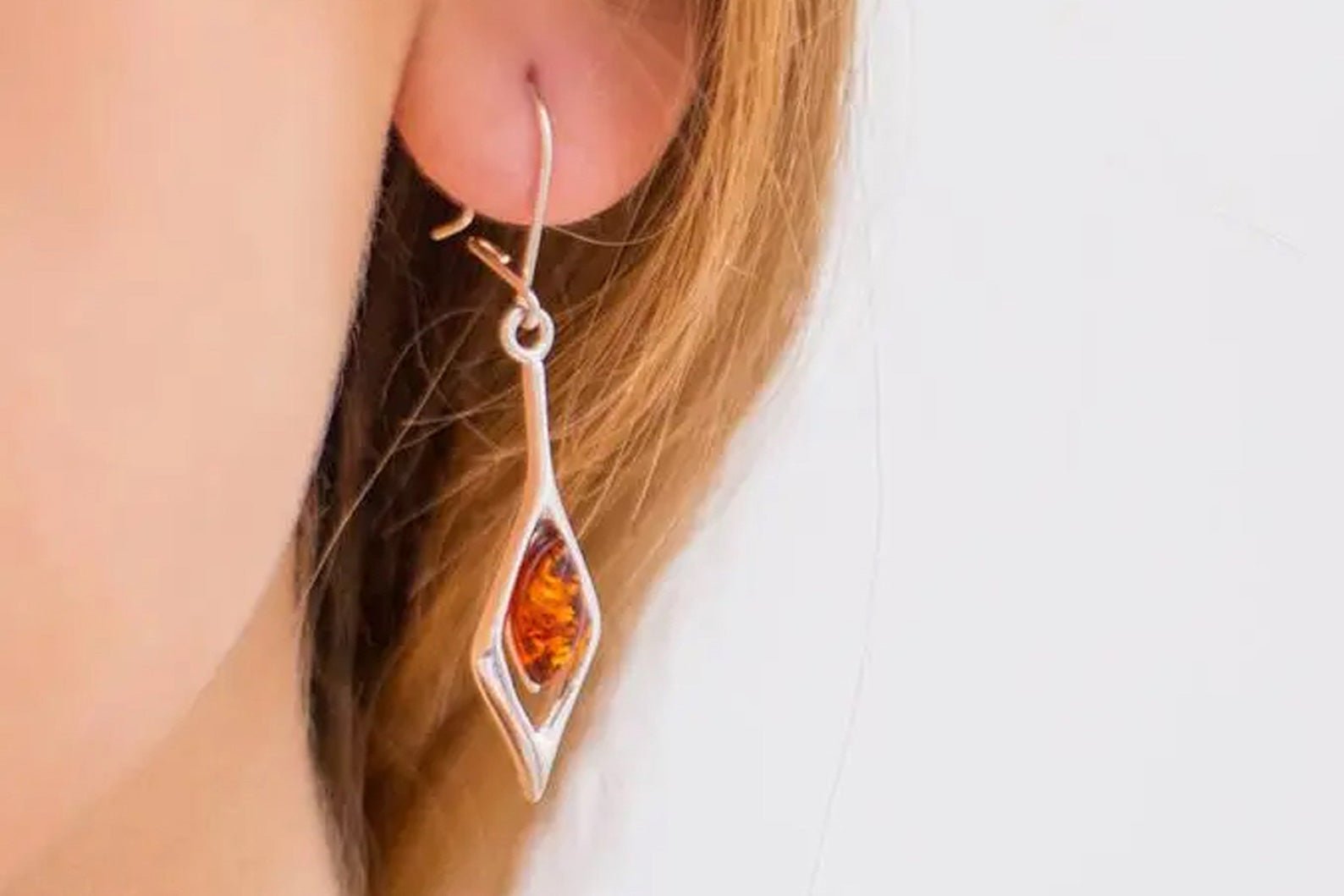 Small Droplet Amber Dangle Earrings - Tucan Trading