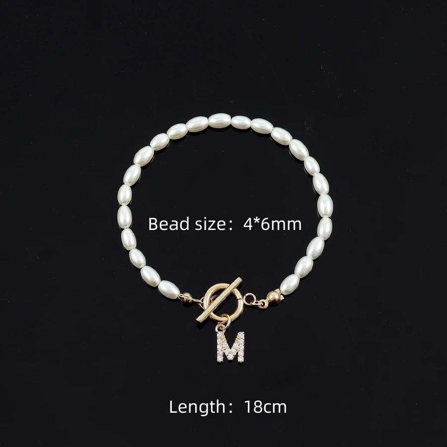 Pave Zircon 26 Initial Bracelet - Tucan Trading