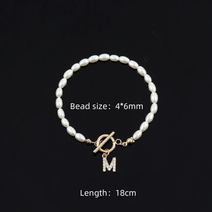 Pave Zircon 26 Initial Bracelet - Tucan Trading