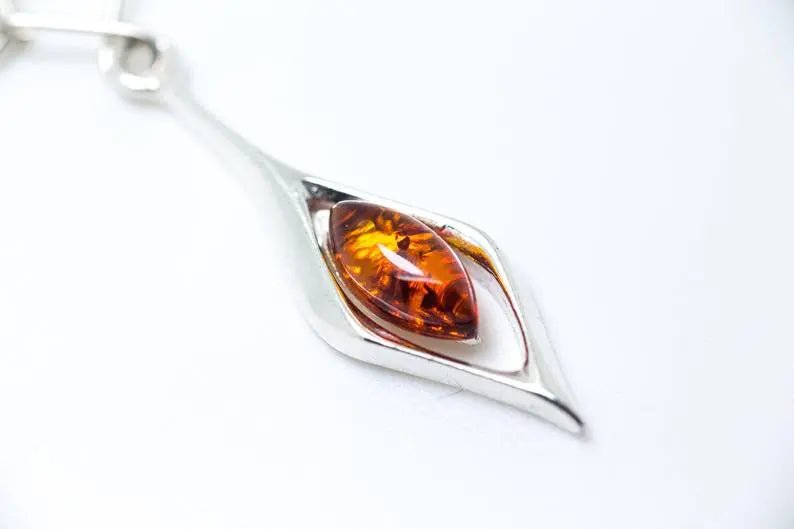 Small Droplet Amber Dangle Earrings - Tucan Trading